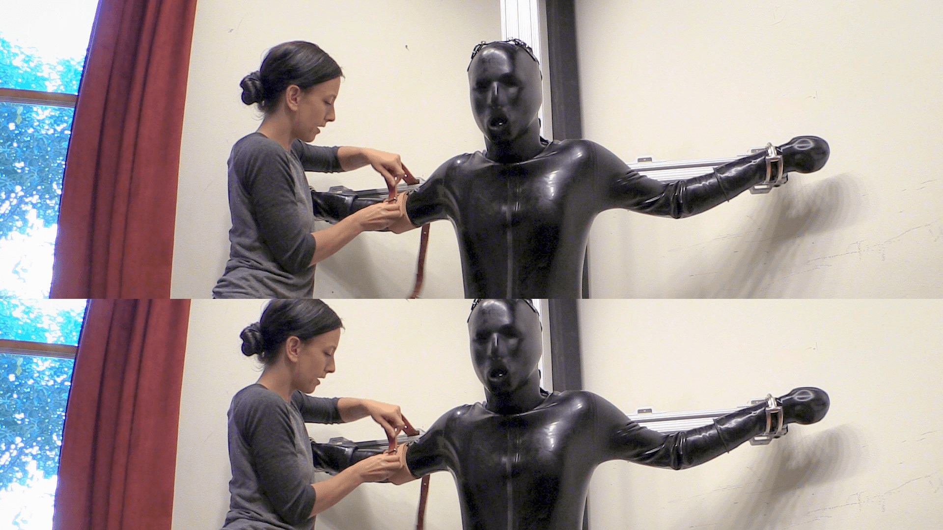Elise Graves in 'Kink' Rubber Catsuit, Metal Bondage (Thumbnail 1)
