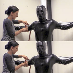 Elise Graves in 'Kink' Rubber Catsuit, Metal Bondage (Thumbnail 1)