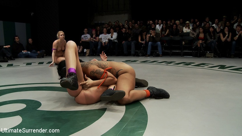 Kink 'RD2: Girls helpless in wrestling holds, getting double teamed. Finger fucked and beaten on the mat.' starring Hollie Stevens (Photo 14)