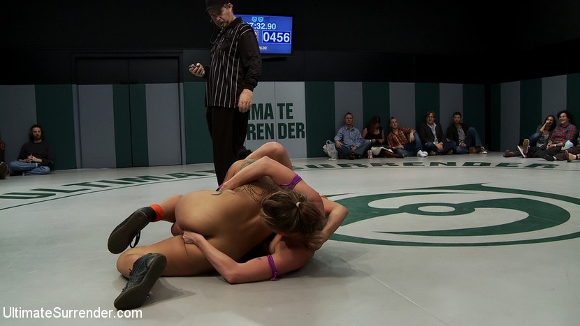 Kink 'RD2: Girls helpless in wrestling holds, getting double teamed. Finger fucked and beaten on the mat.' starring Hollie Stevens (Photo 16)