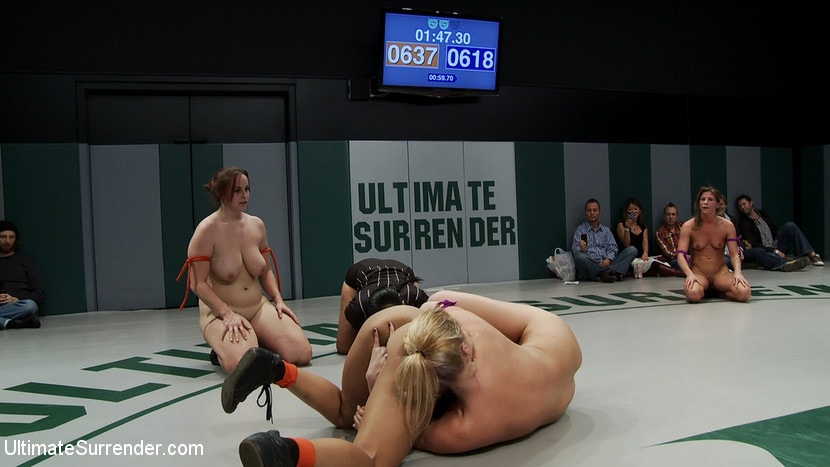 Kink 'RD2: Girls helpless in wrestling holds, getting double teamed. Finger fucked and beaten on the mat.' starring Hollie Stevens (Photo 19)